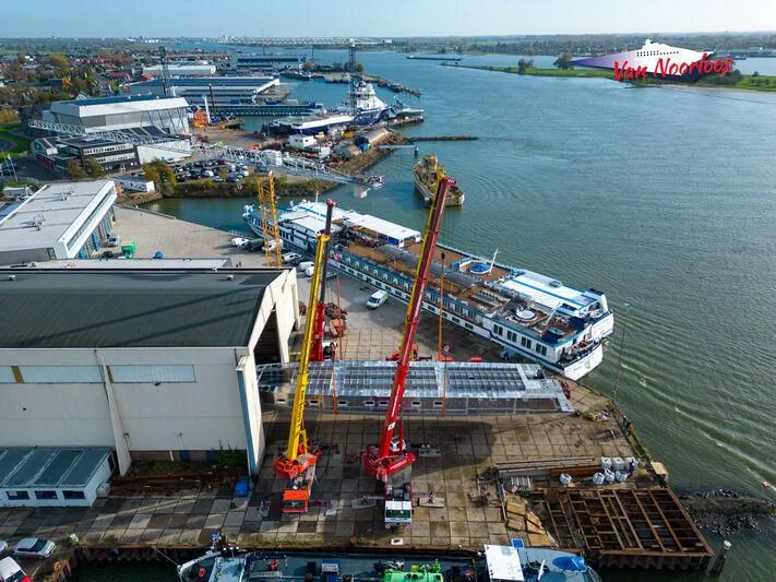 a port with cranes and containers aboard JFA 50M ALUMINIUM EXPLORER Yacht for Sale