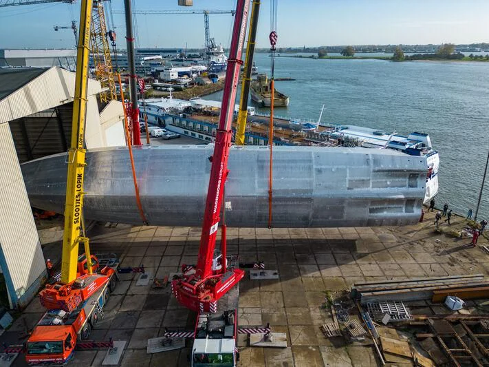 a large ship docked aboard JFA 50M ALUMINIUM EXPLORER Yacht for Sale