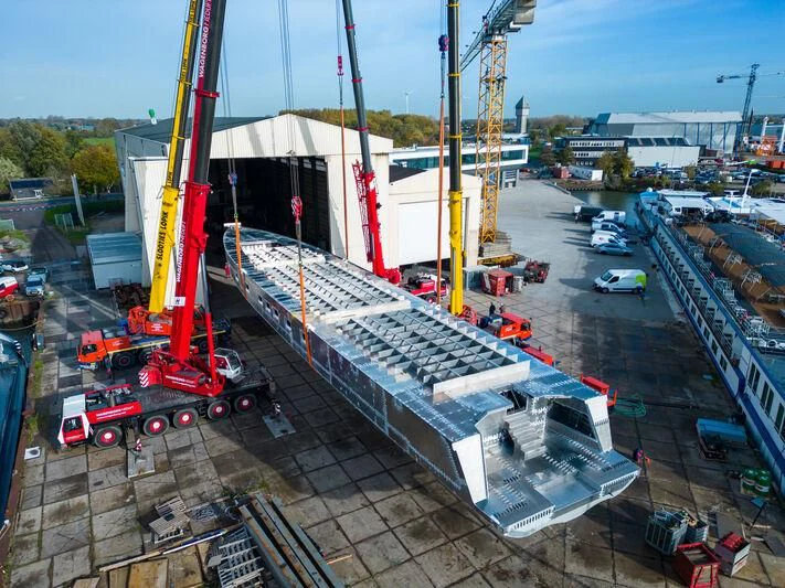 a large crane in a port aboard JFA 50M ALUMINIUM EXPLORER Yacht for Sale