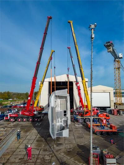 a crane lifting a container aboard JFA 50M ALUMINIUM EXPLORER Yacht for Sale