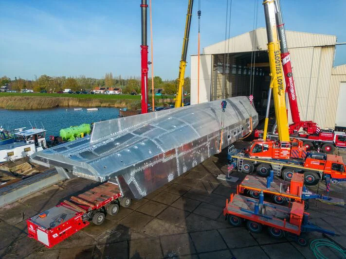 a large machine on a dock aboard JFA 50M ALUMINIUM EXPLORER Yacht for Sale