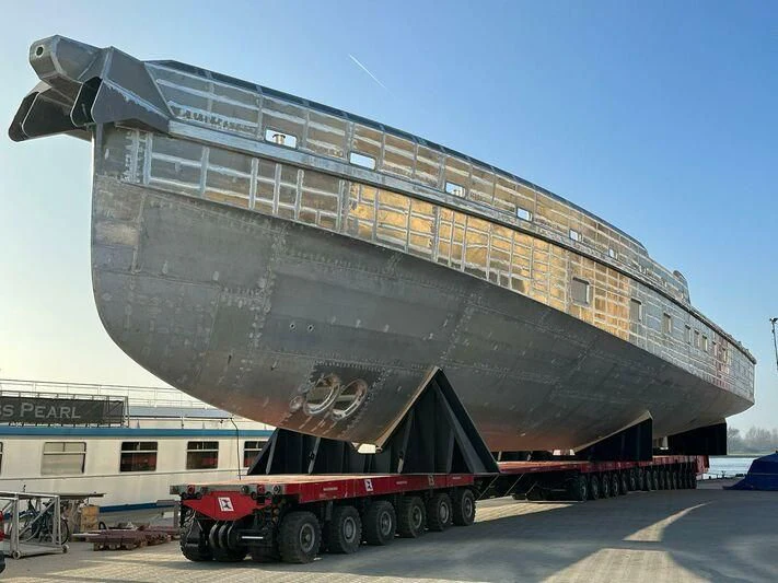 a large ship with a trailer aboard JFA 50M ALUMINIUM EXPLORER Yacht for Sale