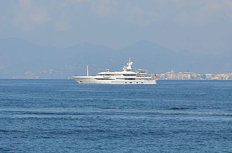 a white boat in the water aboard HALO Yacht for Sale