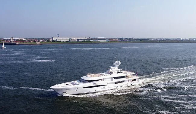 a white boat on the water aboard HALO Yacht for Sale
