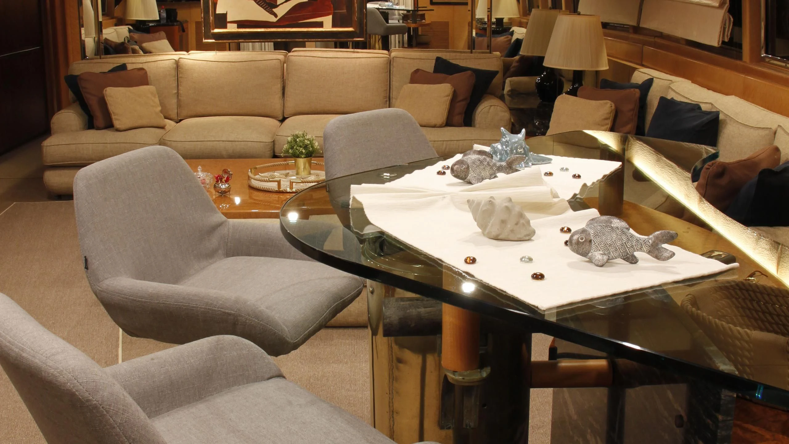 a person lying on a couch aboard CHATO Yacht for Sale