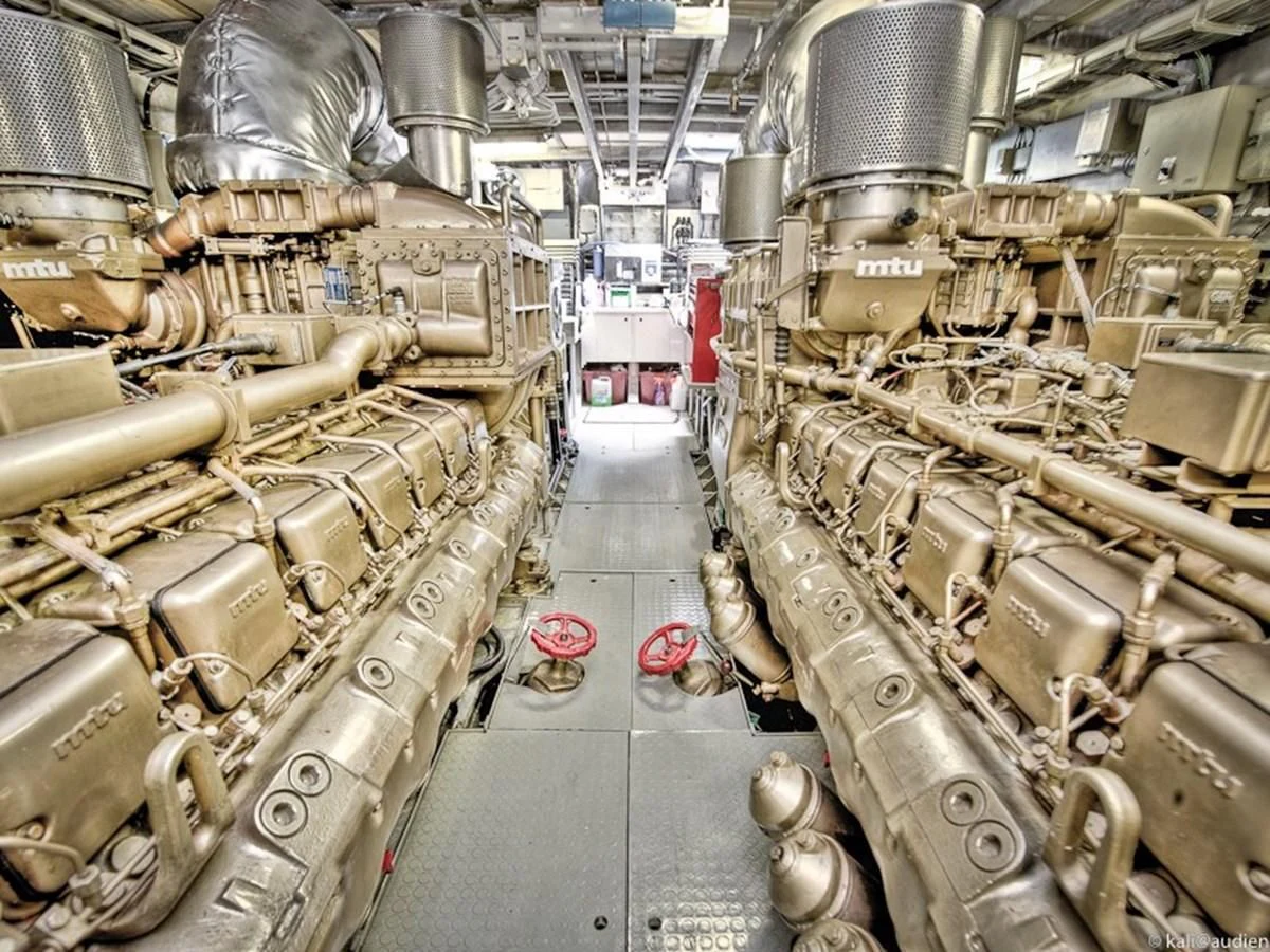 a large machine with many wires aboard CHATO Yacht for Sale