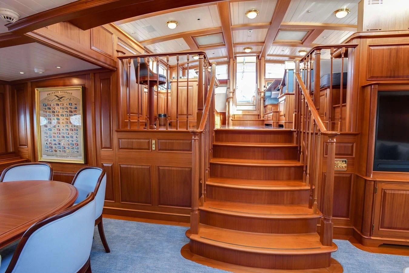 a wooden staircase in a house aboard HERMETICA Yacht for Sale