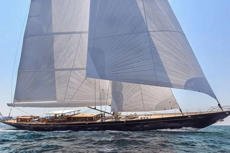 a large sailboat on the water aboard HERMETICA Yacht for Sale