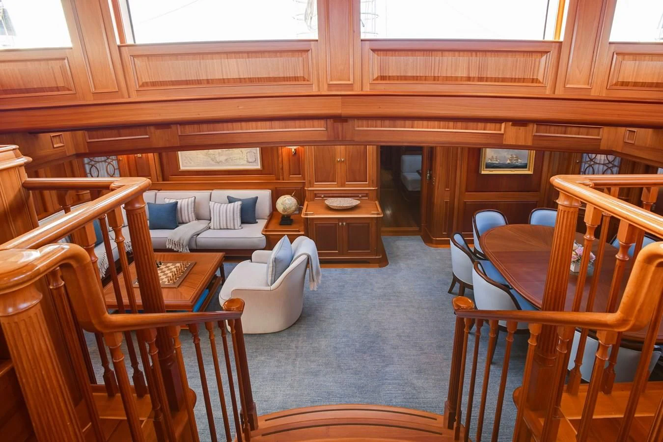 a room with chairs and tables aboard HERMETICA Yacht for Sale