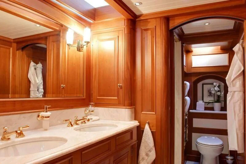 a bathroom with a sink and toilet aboard HERMETICA Yacht for Sale