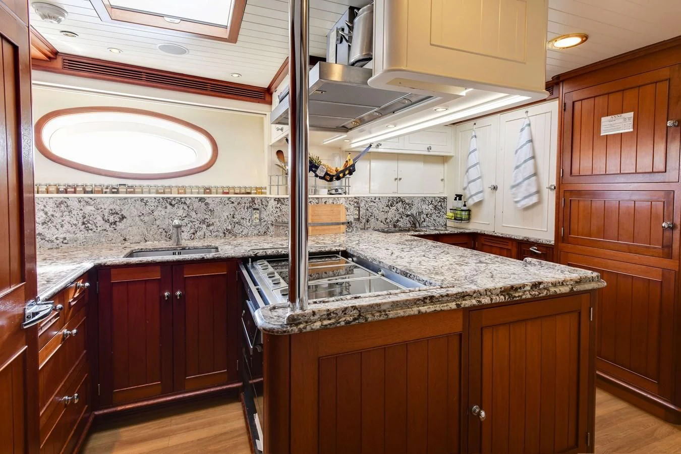 a kitchen with a large sink aboard HERMETICA Yacht for Sale