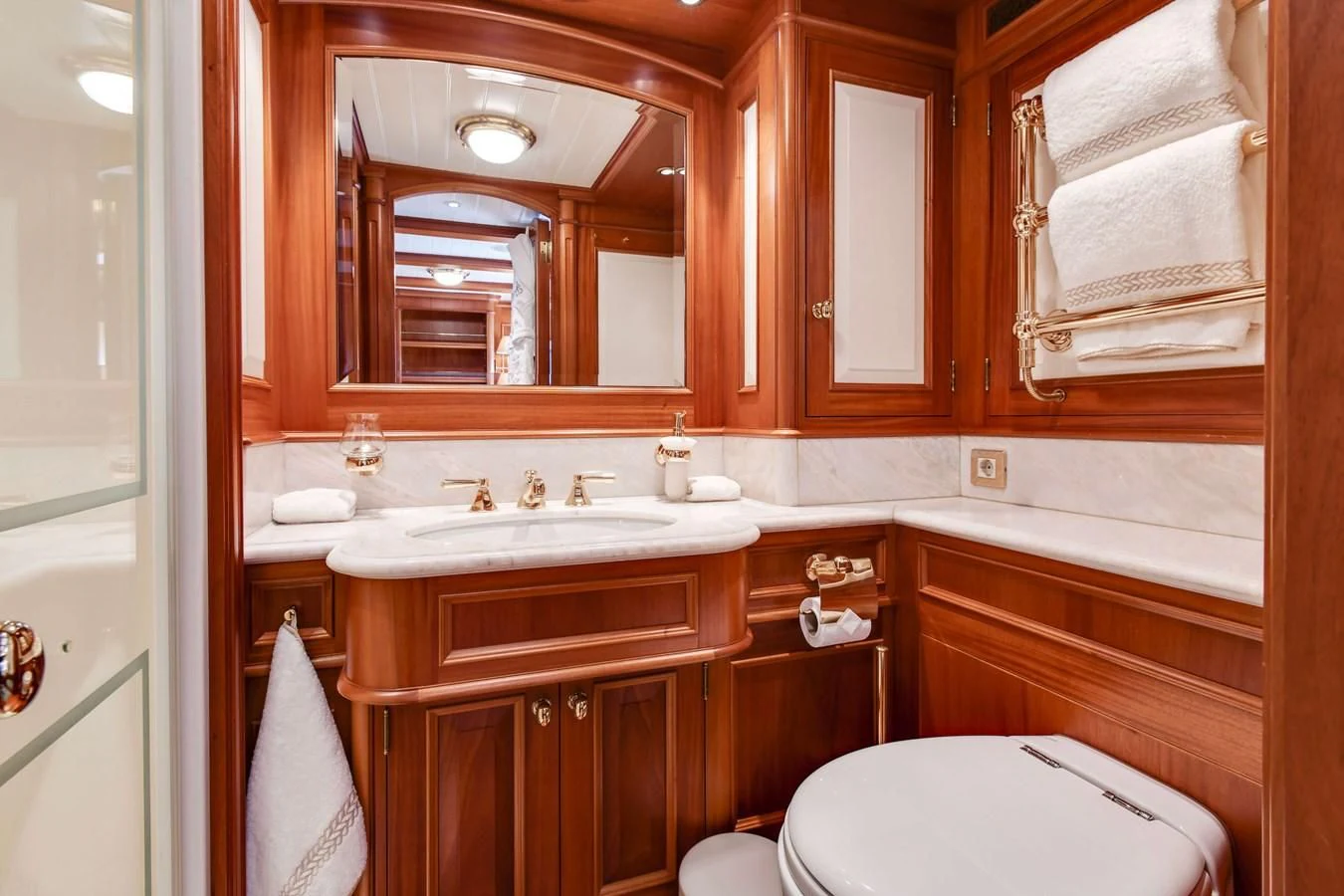 a bathroom with a sink and toilet aboard HERMETICA Yacht for Sale