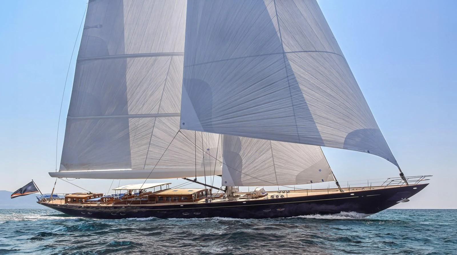 a large sailboat on the water aboard HERMETICA Yacht for Sale