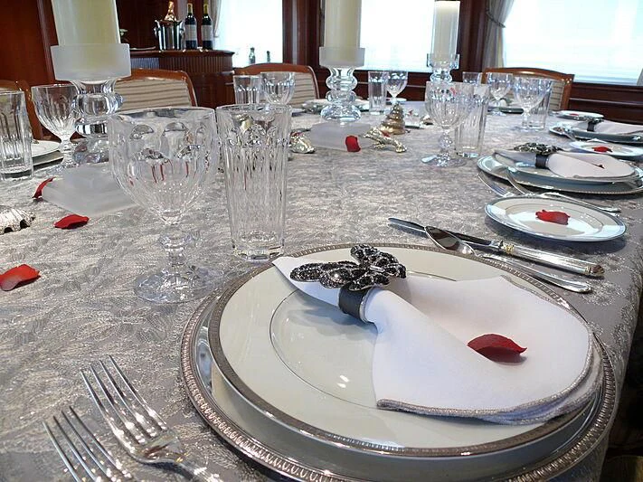 a table set with place settings aboard BLIND DATE TOO Yacht for Sale