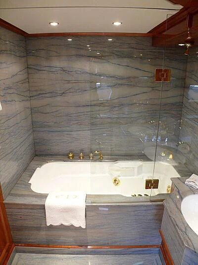 a bathroom with a bathtub aboard BLIND DATE TOO Yacht for Sale