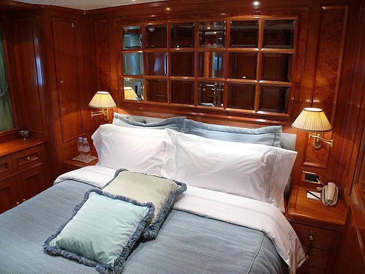 a bed with pillows aboard BLIND DATE TOO Yacht for Sale