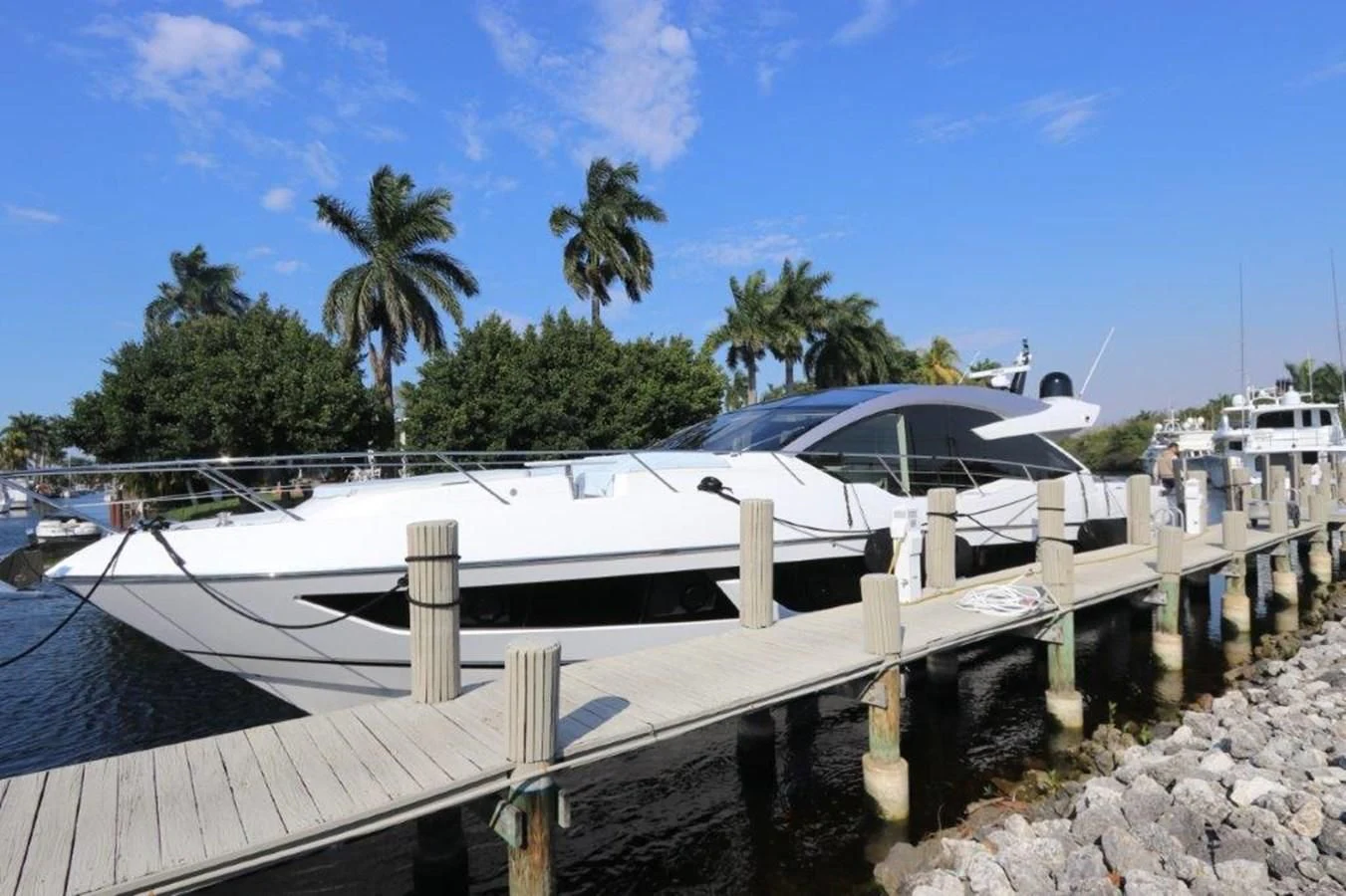 a boat docked at a pier aboard HIDE OUT Yacht for Sale