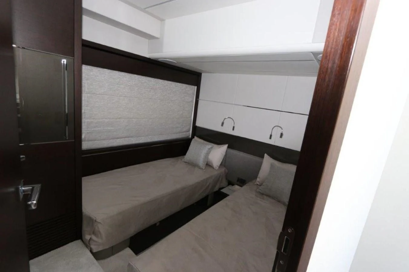 a room with two beds aboard HIDE OUT Yacht for Sale
