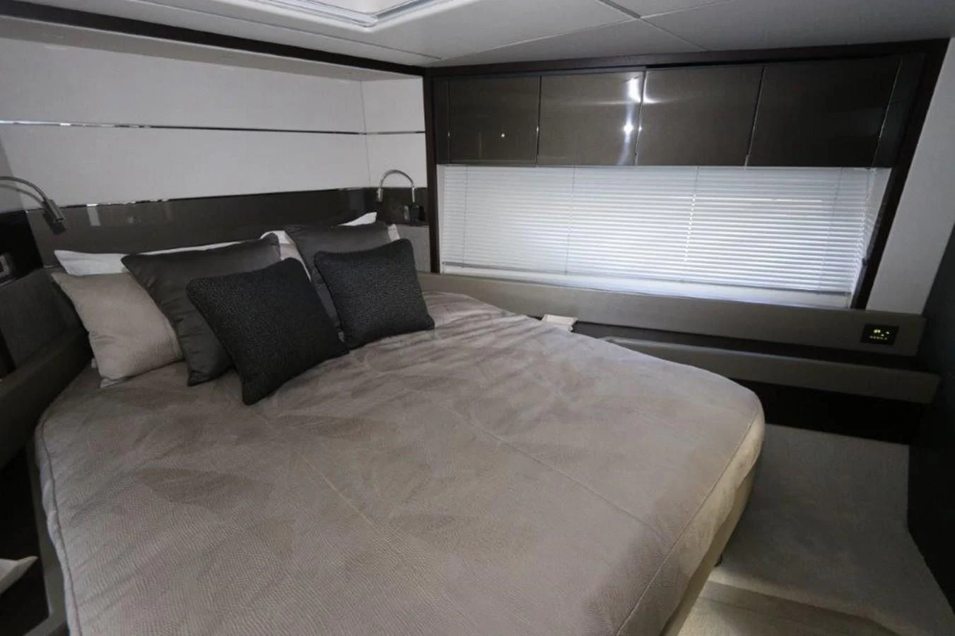a bed with pillows aboard HIDE OUT Yacht for Sale