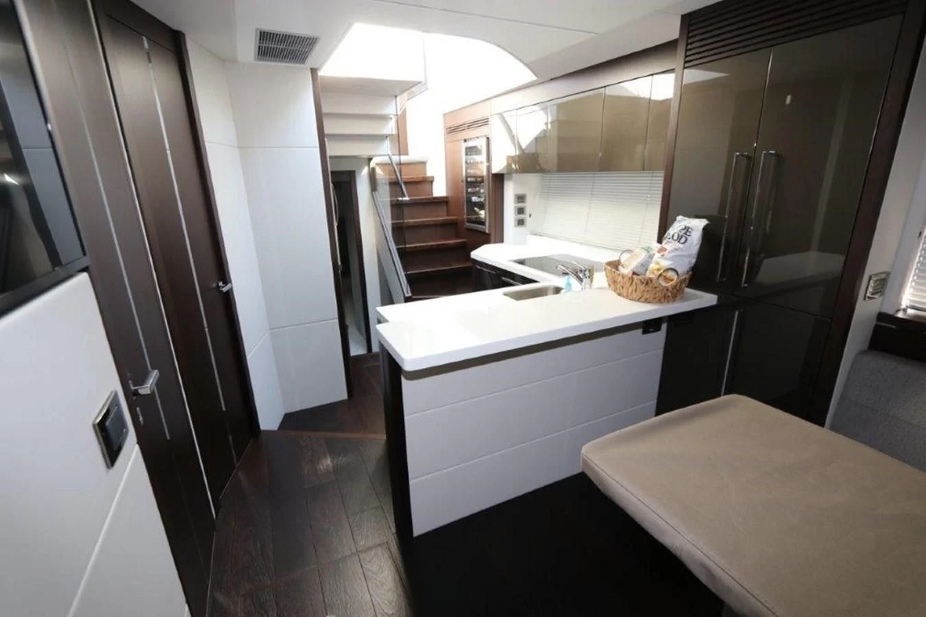 a kitchen with a sink and a table aboard HIDE OUT Yacht for Sale