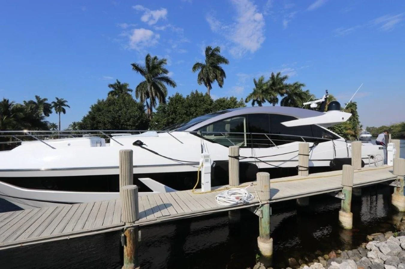 a boat docked at a pier aboard HIDE OUT Yacht for Sale