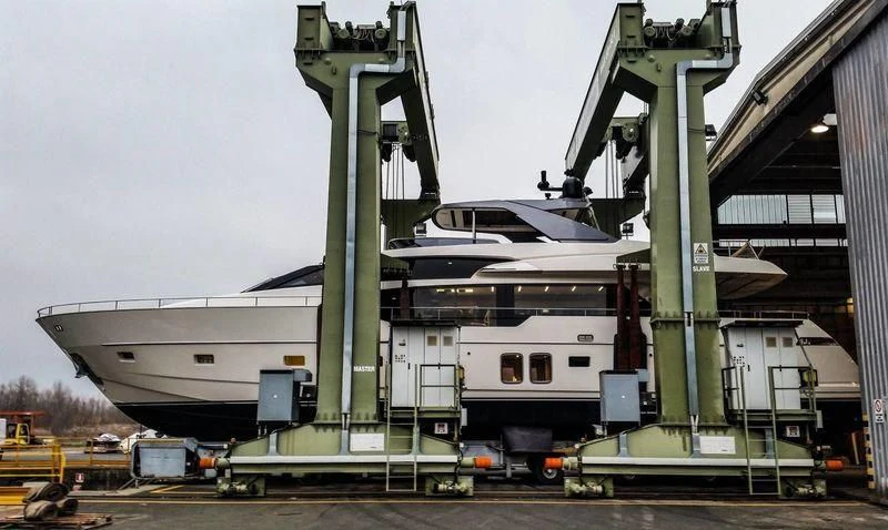 a large factory with large green pipes aboard CHONY Yacht for Sale