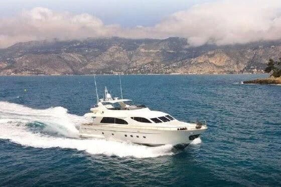 a white yacht on the water aboard ARAMIS ONE Yacht for Sale