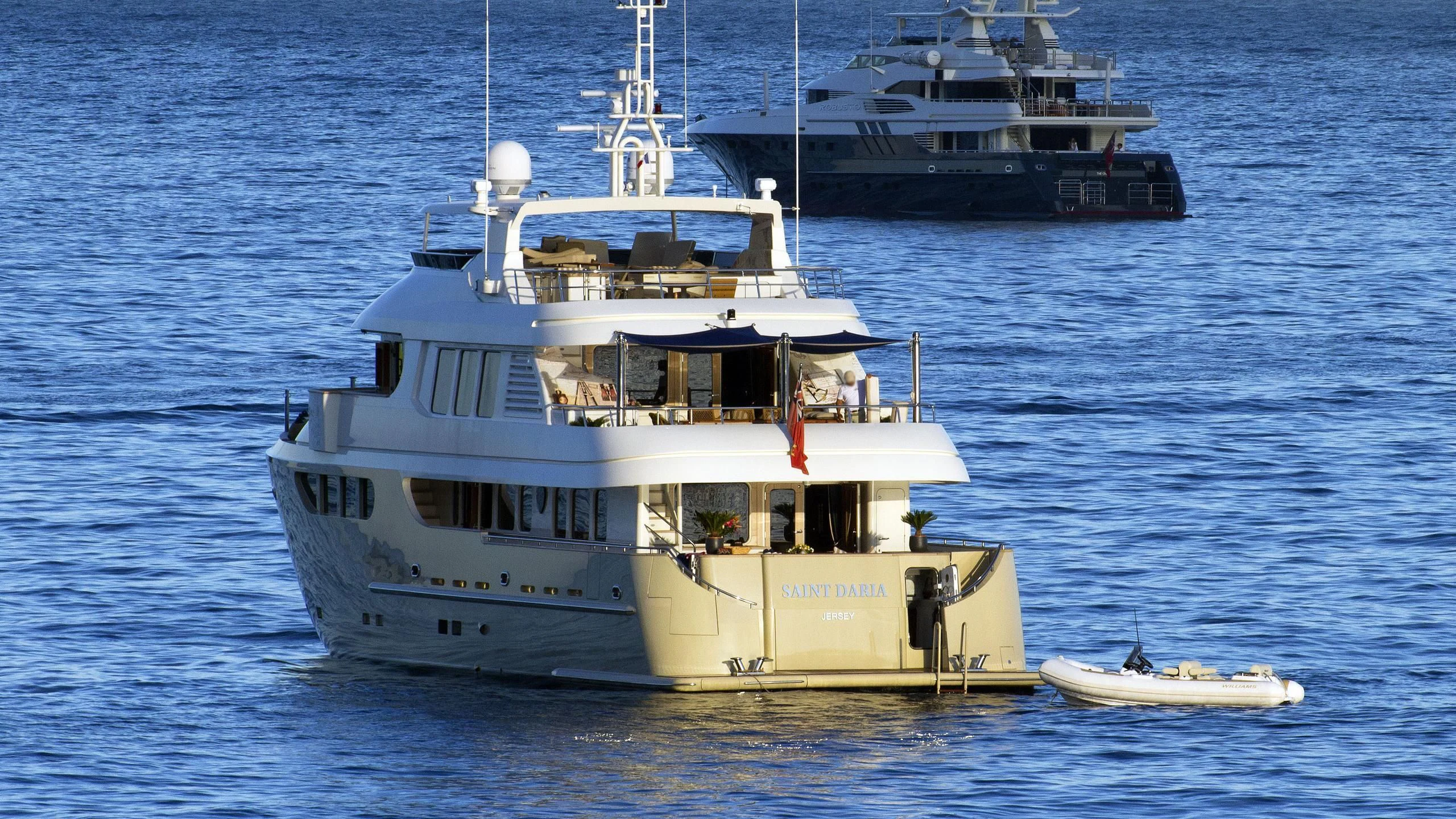 a large boat with a smaller boat on it aboard O Yacht for Sale