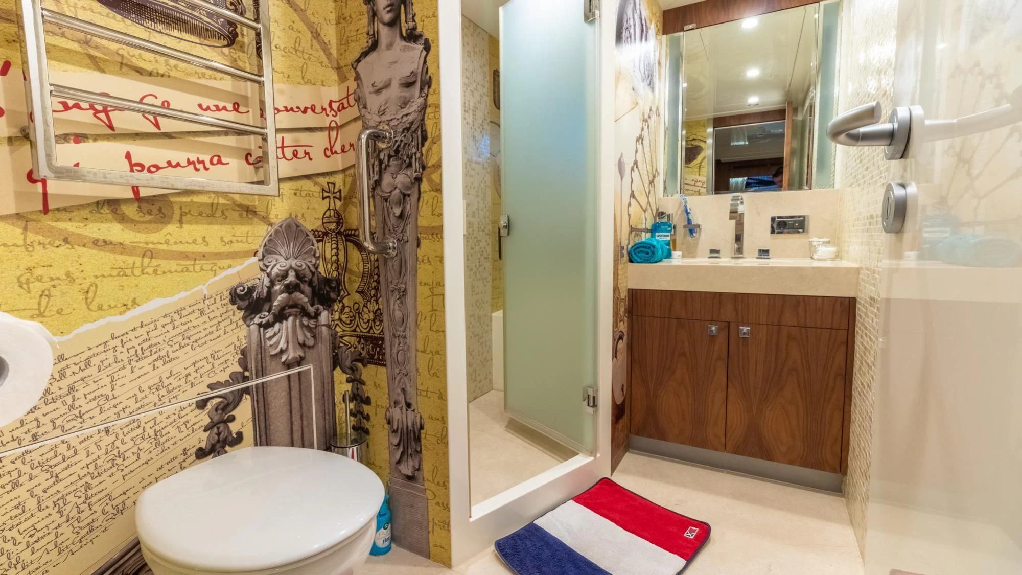 a bathroom with a toilet and sink aboard O Yacht for Sale