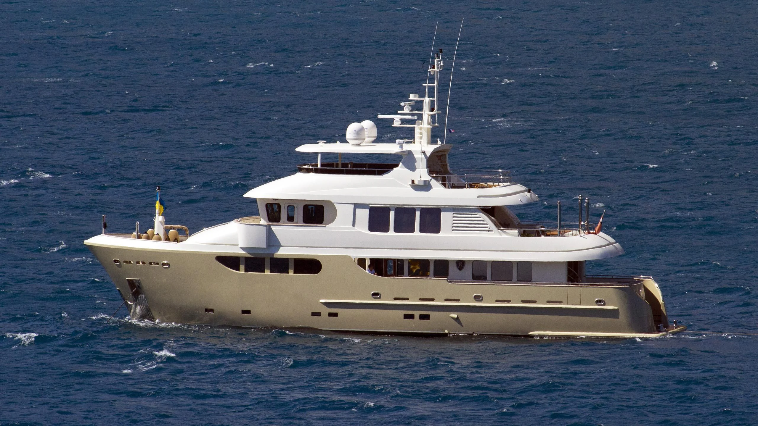 a white boat in the water aboard O Yacht for Sale