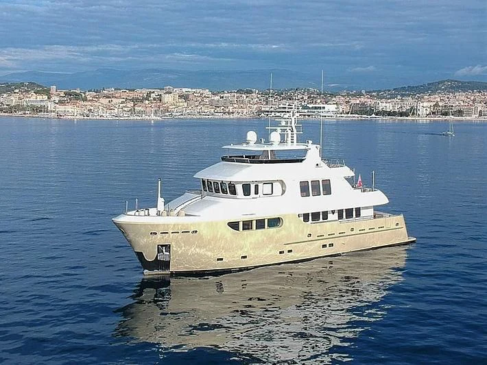a white boat in the water aboard O Yacht for Sale
