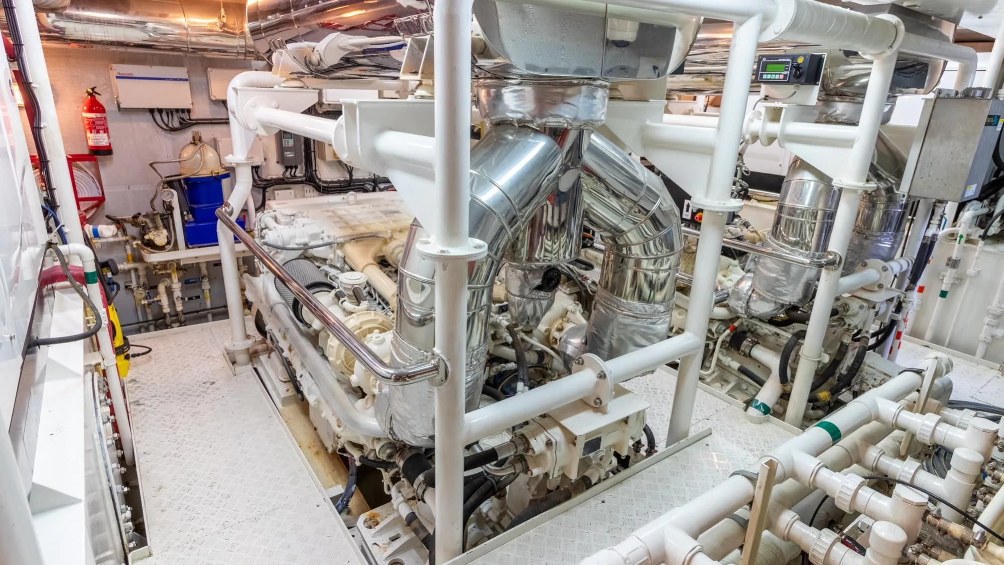 a room with pipes and tubes aboard O Yacht for Sale