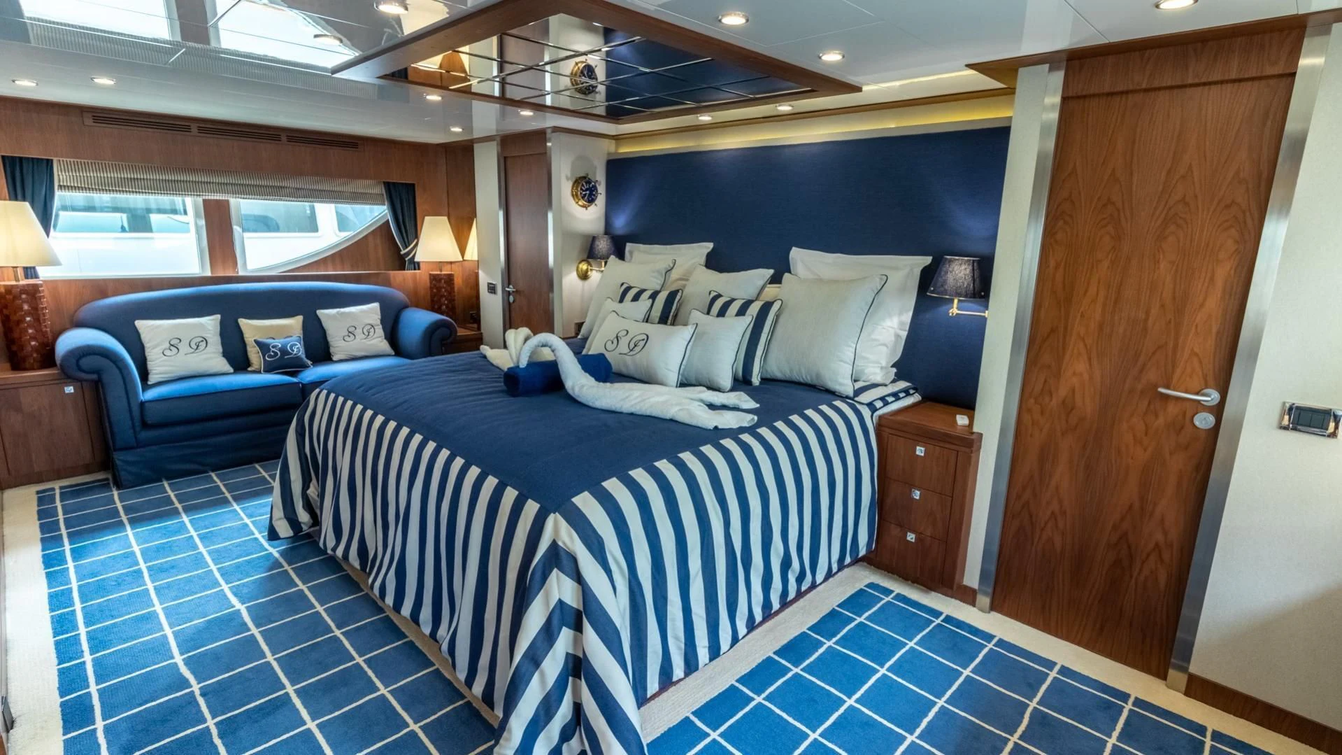 a bed in a room aboard O Yacht for Sale