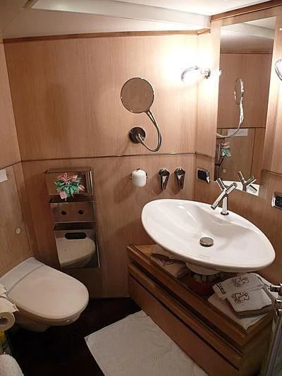 a bathroom with a sink and toilet aboard ALTER EGO Yacht for Sale