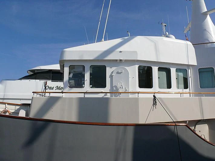 a white yacht on the water aboard ALTER EGO Yacht for Sale