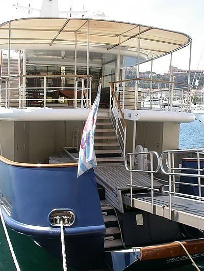 a boat with a flag aboard ALTER EGO Yacht for Sale