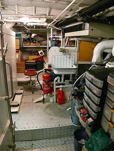a room with a lot of stuff on the shelves aboard ALTER EGO Yacht for Sale