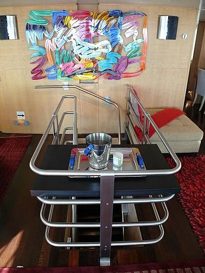 a table with a painting on it aboard ALTER EGO Yacht for Sale