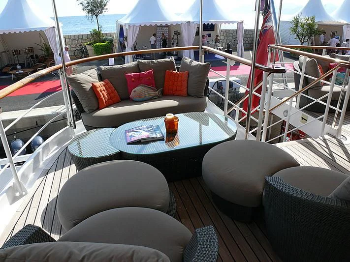 a living room with a couch and a table aboard ALTER EGO Yacht for Sale