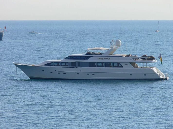 a white yacht in the water aboard THE JOB Yacht for Sale