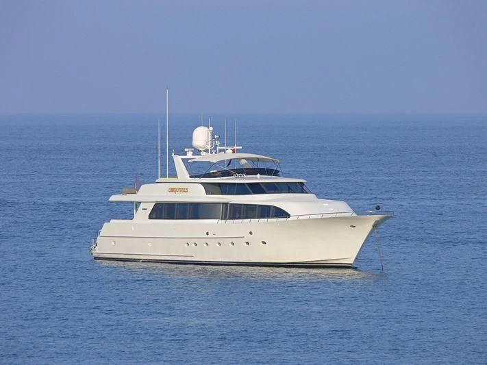 a white yacht in the water aboard THE JOB Yacht for Sale