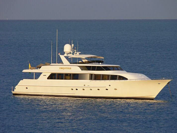 a white yacht in the water aboard THE JOB Yacht for Sale