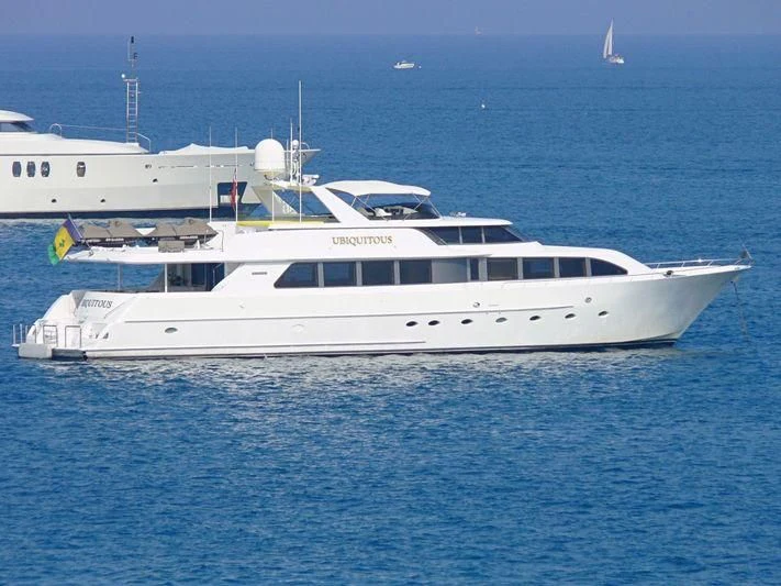 a white yacht in the water aboard THE JOB Yacht for Sale