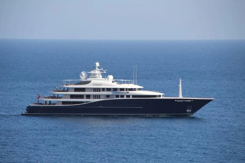 a large white ship in the water aboard AQUILA Yacht for Sale
