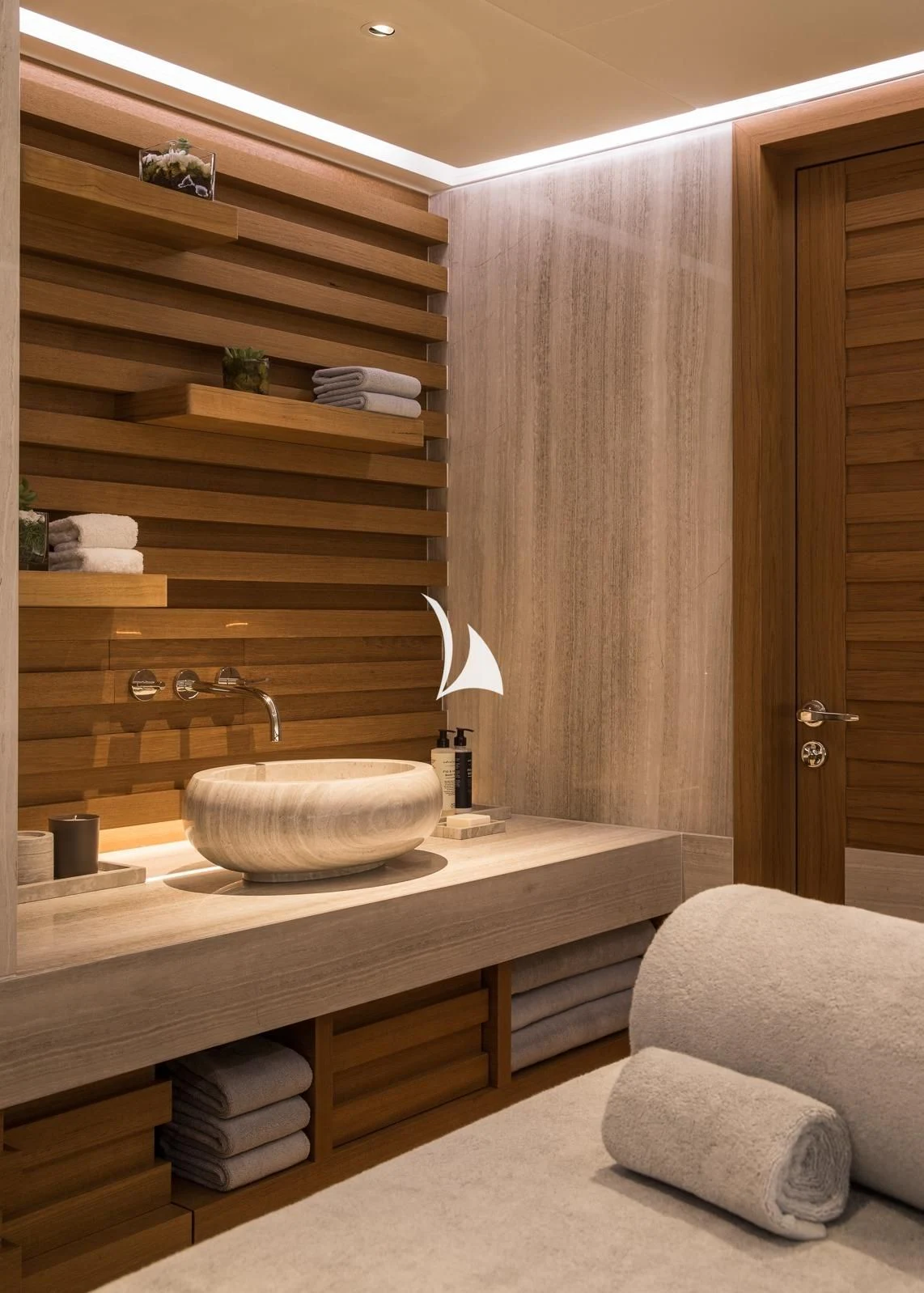 a bathroom with a large sink aboard AQUILA Yacht for Sale
