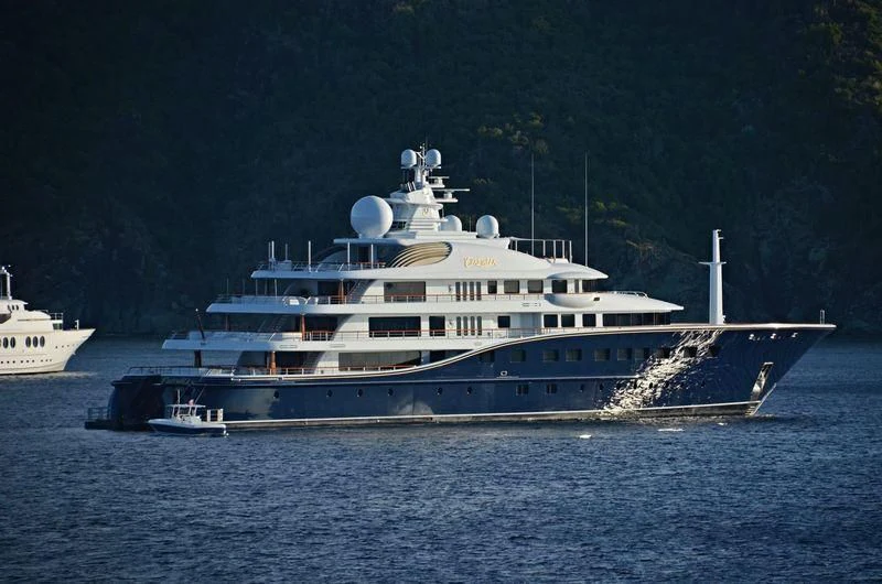 a large white boat in the water aboard AQUILA Yacht for Sale
