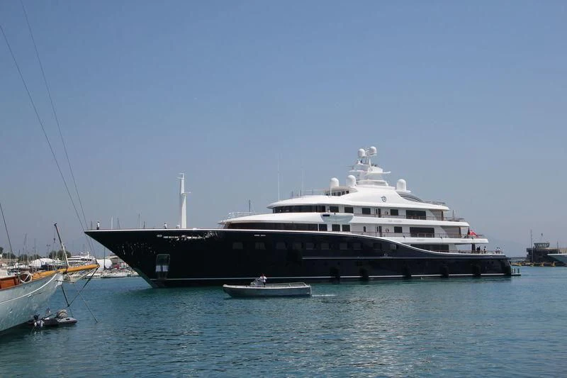 a large boat in the water aboard AQUILA Yacht for Sale