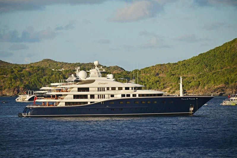 a large ship in the water aboard AQUILA Yacht for Sale