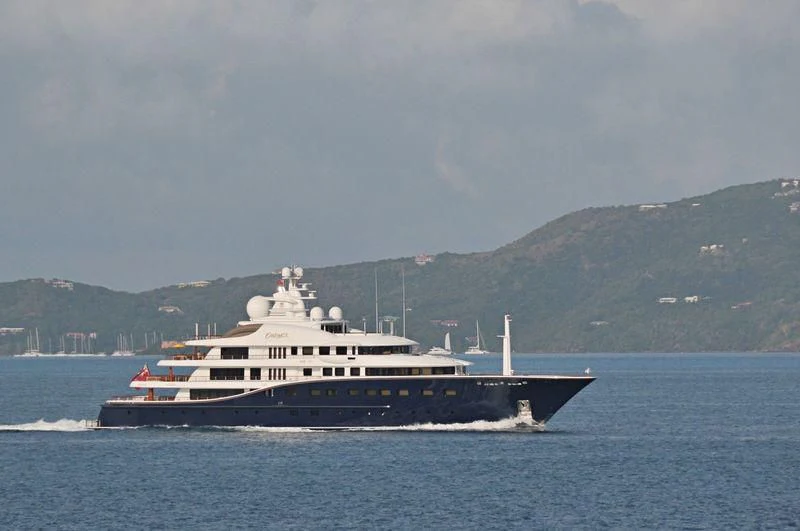 a large boat on the water aboard AQUILA Yacht for Sale