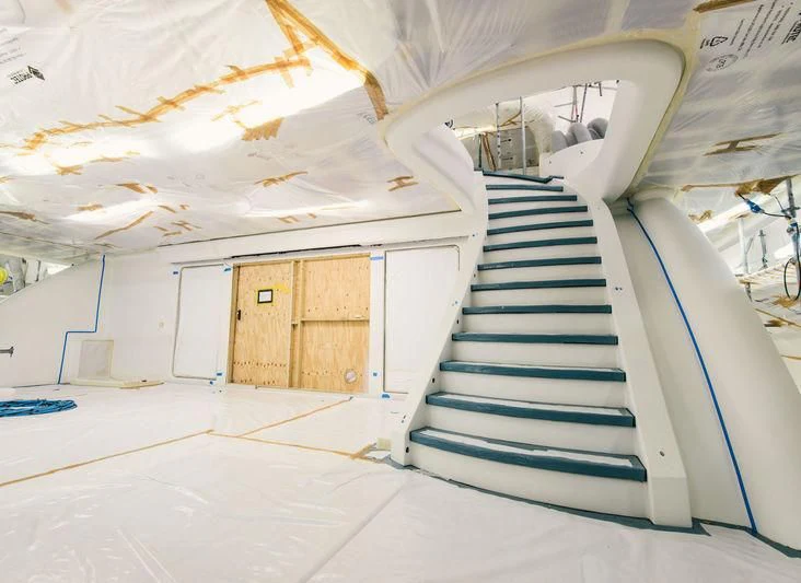 a staircase in a building aboard AQUILA Yacht for Sale